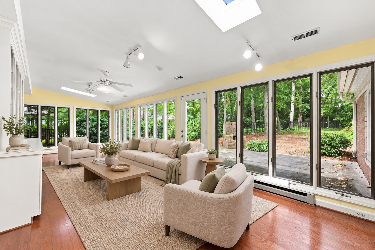 Illustrative virtual staging of the 3528 Broadfield sunroom with movable furniture